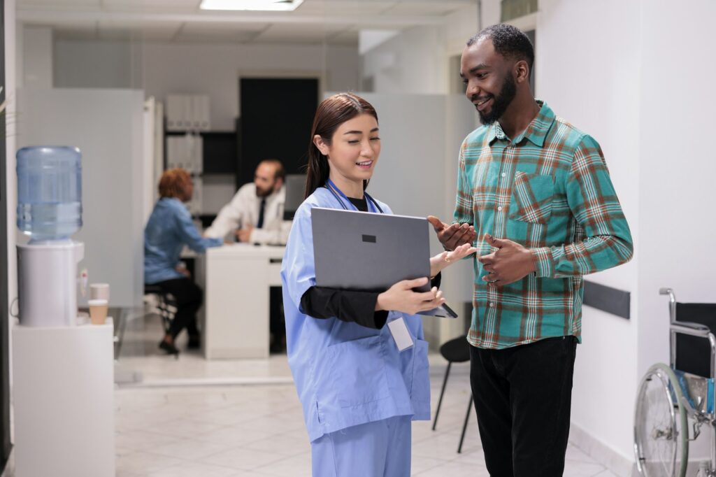 Sanatorium staff attending african american patients